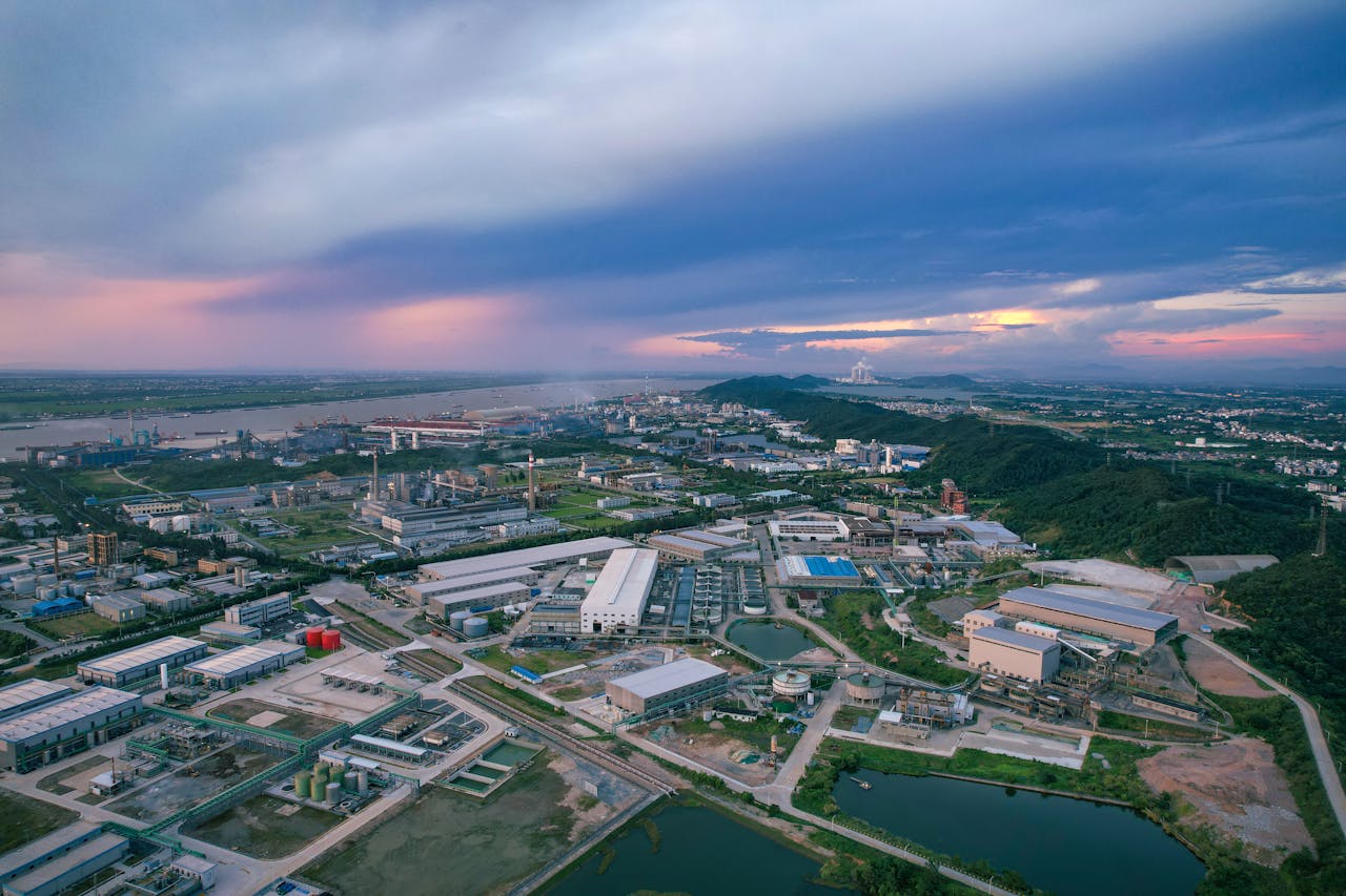 A stunning aerial view of an industrial area at sunset in Jiujiang, China.